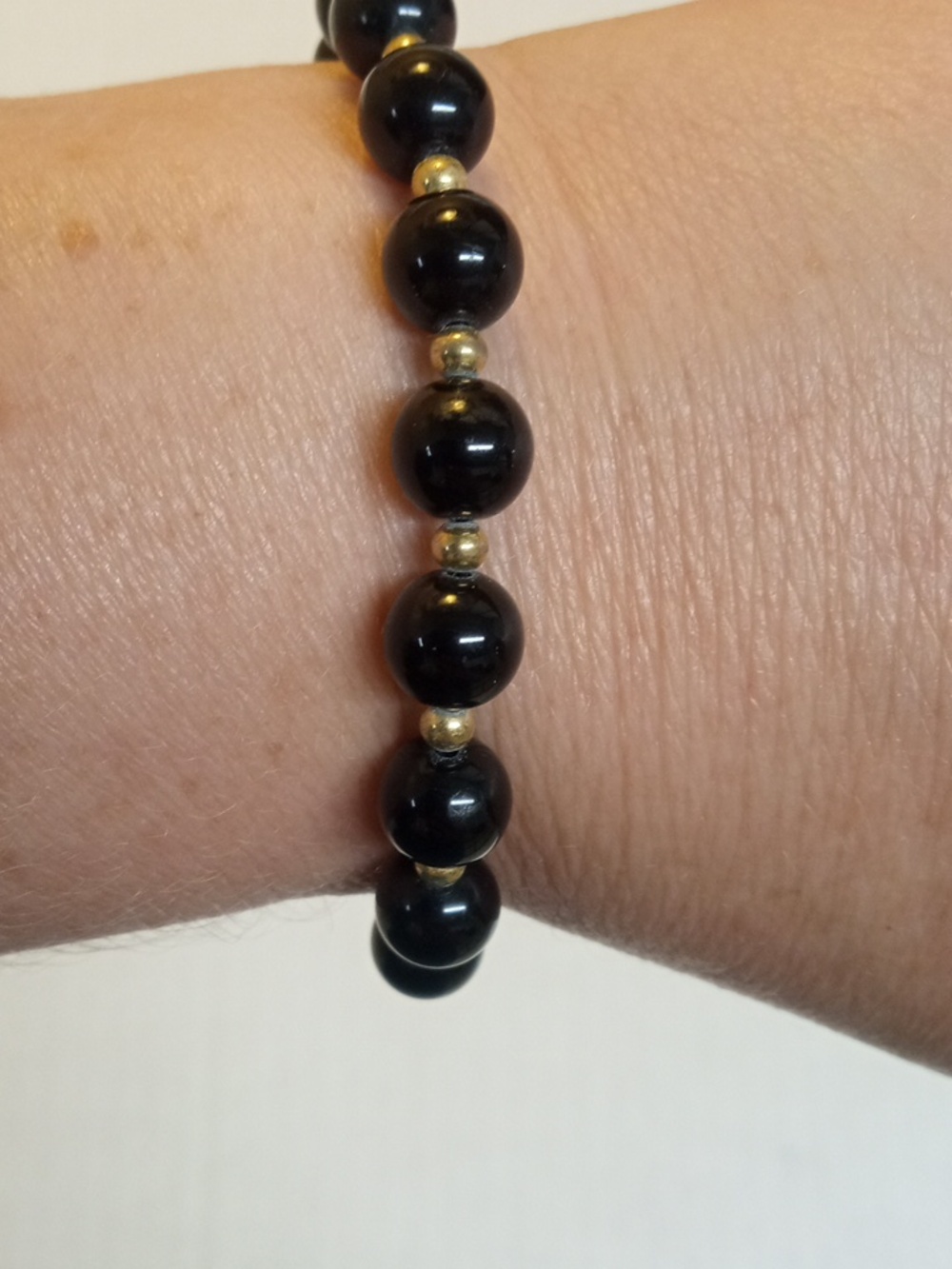 Monet Bracelet Vintage Signed Black Bead Stretch Bracelet with Gold Accents